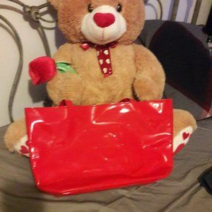 Carolina Herrera shopping bag/ Any free item once purchased